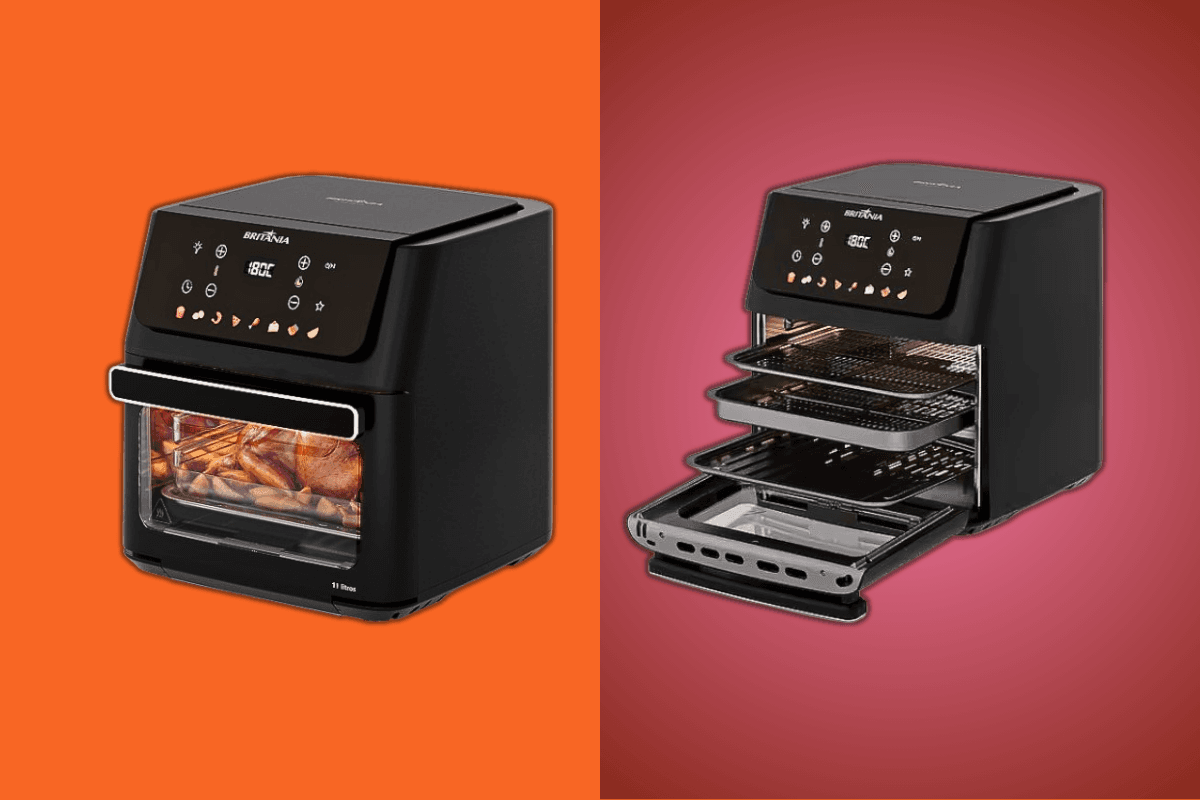 Fritadeira Air Fryer Oven Britânia 11 litros preta posicionada na bancada de uma cozinha moderna com a luz interna acesa.